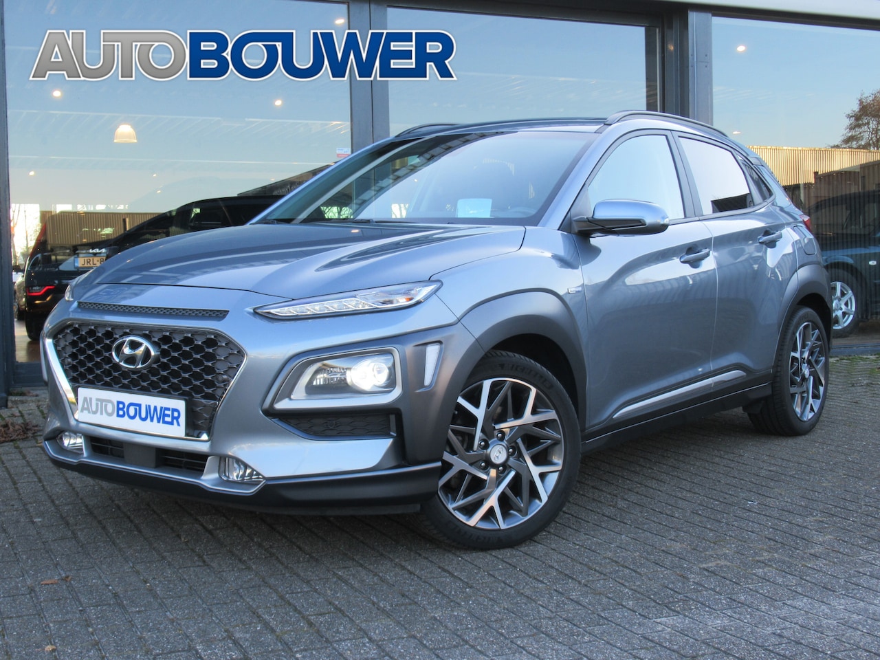 Hyundai Kona - 1.6 GDI HEV Premium Sky 1e eigen | dealer onderh | full option!! | leder | schuifdak - AutoWereld.nl