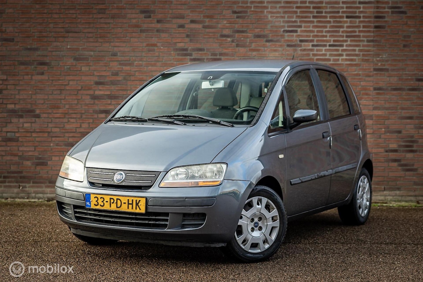 Fiat Idea - 1.4-16V Active| Nap | Apk 12-26 | Airco | Trekhaak - AutoWereld.nl