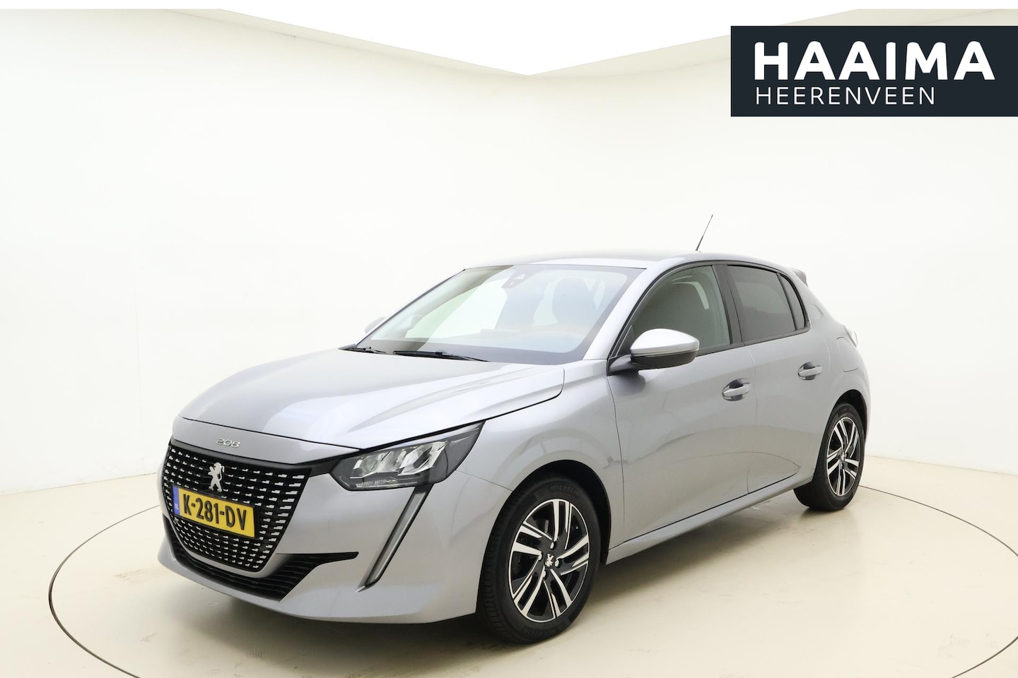 Peugeot 208 - 1.2 PureTech Allure 100pk Automaat | Navigatie | LM velgen extra getint | Climate Control - AutoWereld.nl