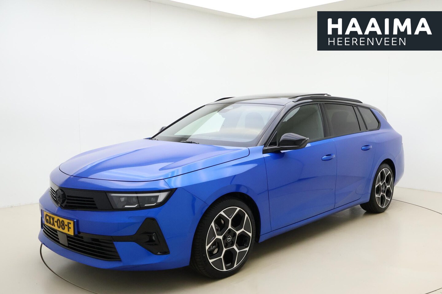 Opel Astra Sports Tourer - 1.2 Turbo 130pk Automaat Ultimate | Navigatie | Trekhaak | Panoramadak | Elektrische achte - AutoWereld.nl