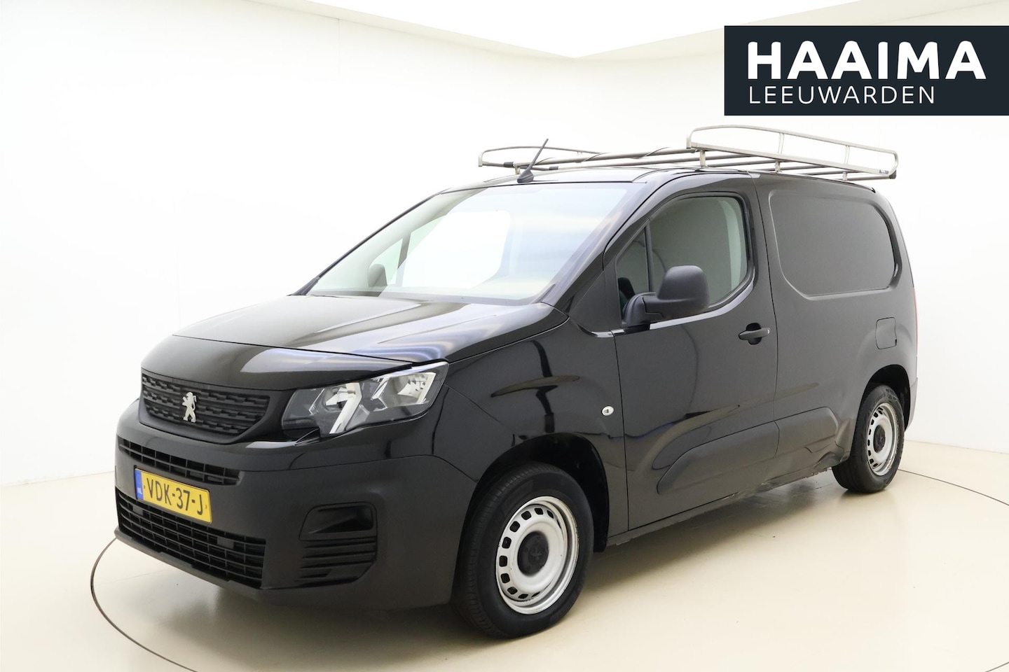 Peugeot Partner - 1.5 BlueHDI Pro 75 PK | Handgeschakeld | Imperiaal | 2-zits | Trekhaak | Laadvloer | Airco - AutoWereld.nl