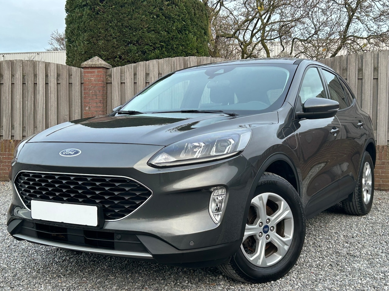Ford Kuga - 2.5 PHEV Titanium Ford Kuga 2.5 PHEV 2022 – | Navi | Stoelverwarming - AutoWereld.nl