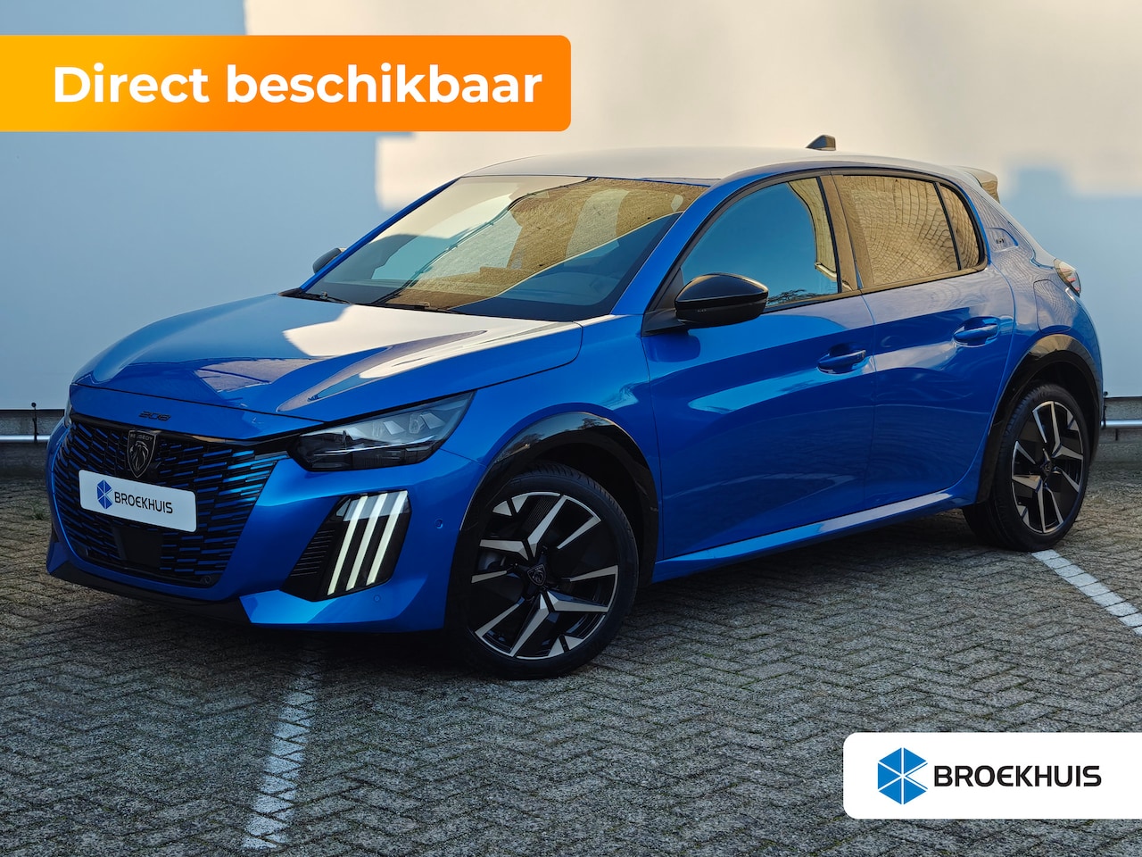 Peugeot 208 - GT | Armsteunen op de voorportieren bekleed met kunstleder met groen sierstiksel (GT-Line) - AutoWereld.nl