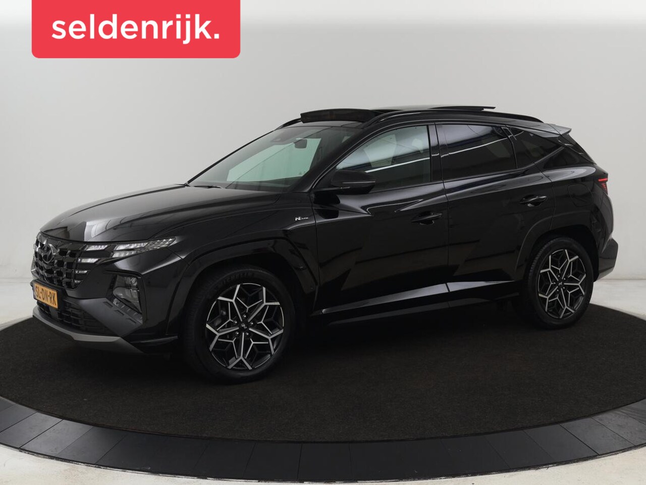 Hyundai Tucson - 1.6 T-GDI PHEV N Line Sky 4WD | Panoramadak | Leder/Alcantara | Stoelverwarming | Camera | - AutoWereld.nl