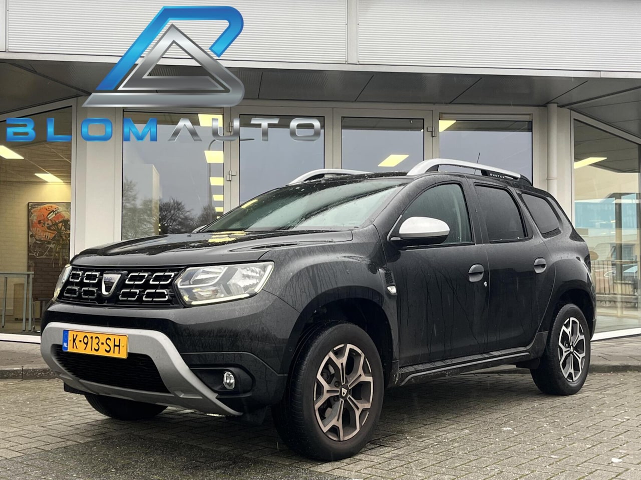 Dacia Duster - 101PK TCe Bi-Fuel LEDER+TREKHAAK+KEYLESS+360CAM - AutoWereld.nl