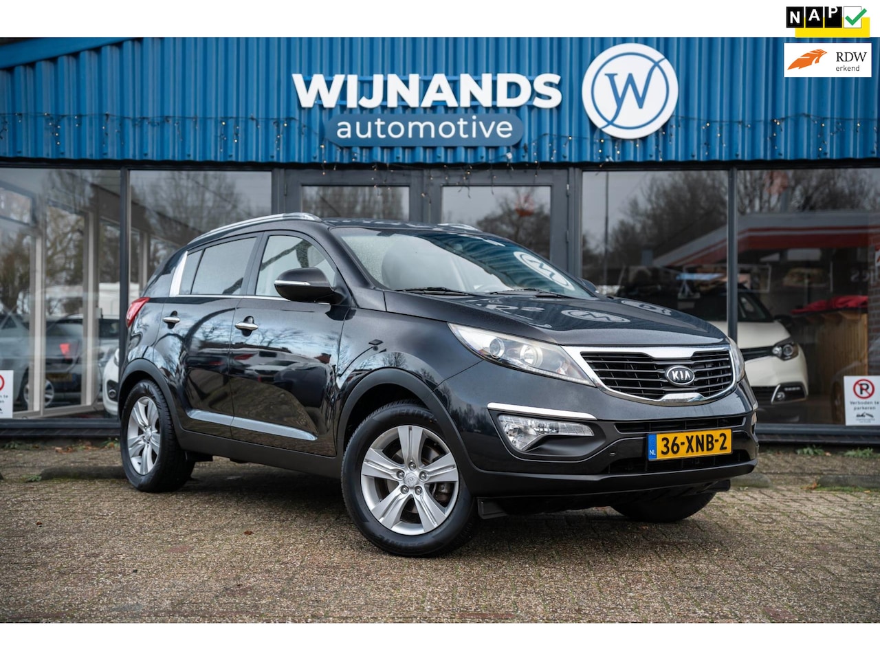 Kia Sportage - 2.0 X-ecutive Super Pack Trekhaak Cruise Clima - AutoWereld.nl