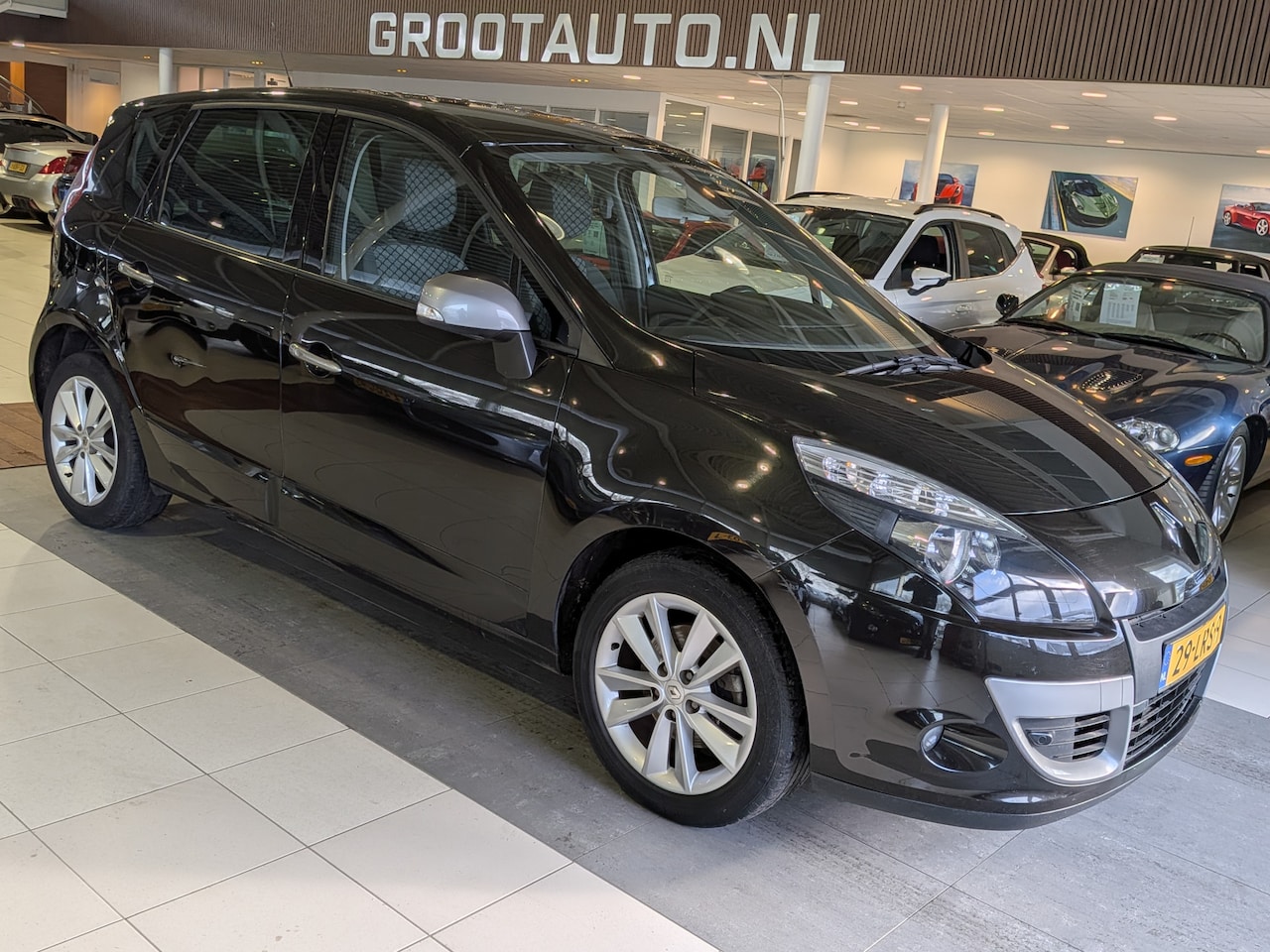 Renault Scénic - 1.6 Celsium Airco, Cruise Control, Stuurbekrachtiging - AutoWereld.nl