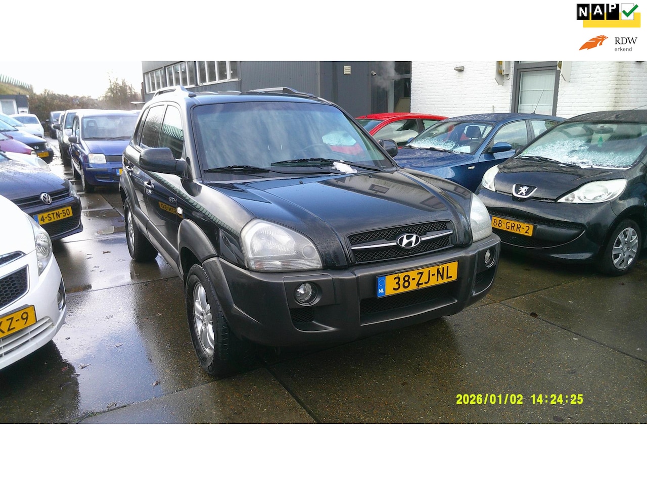 Hyundai Tucson - 2.0i Style leeer airco elek pak nap apk - AutoWereld.nl