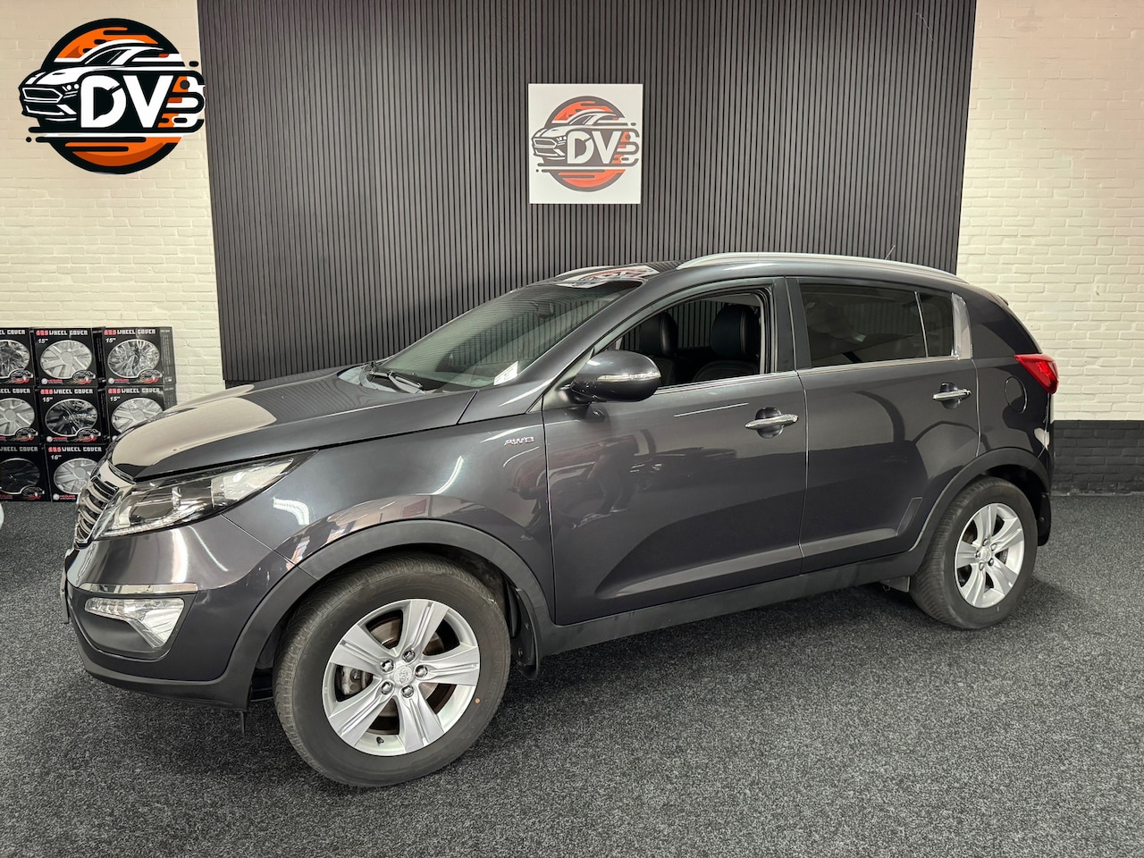 Kia Sportage - 2.0 X-ecutive 4wd Plus Pack 2.0 X-ecutive 4wd Plus Pack, AUTOMAAT, CLIMAT, HALF LEDER, TREKHAAK, PDC - AutoWereld.nl