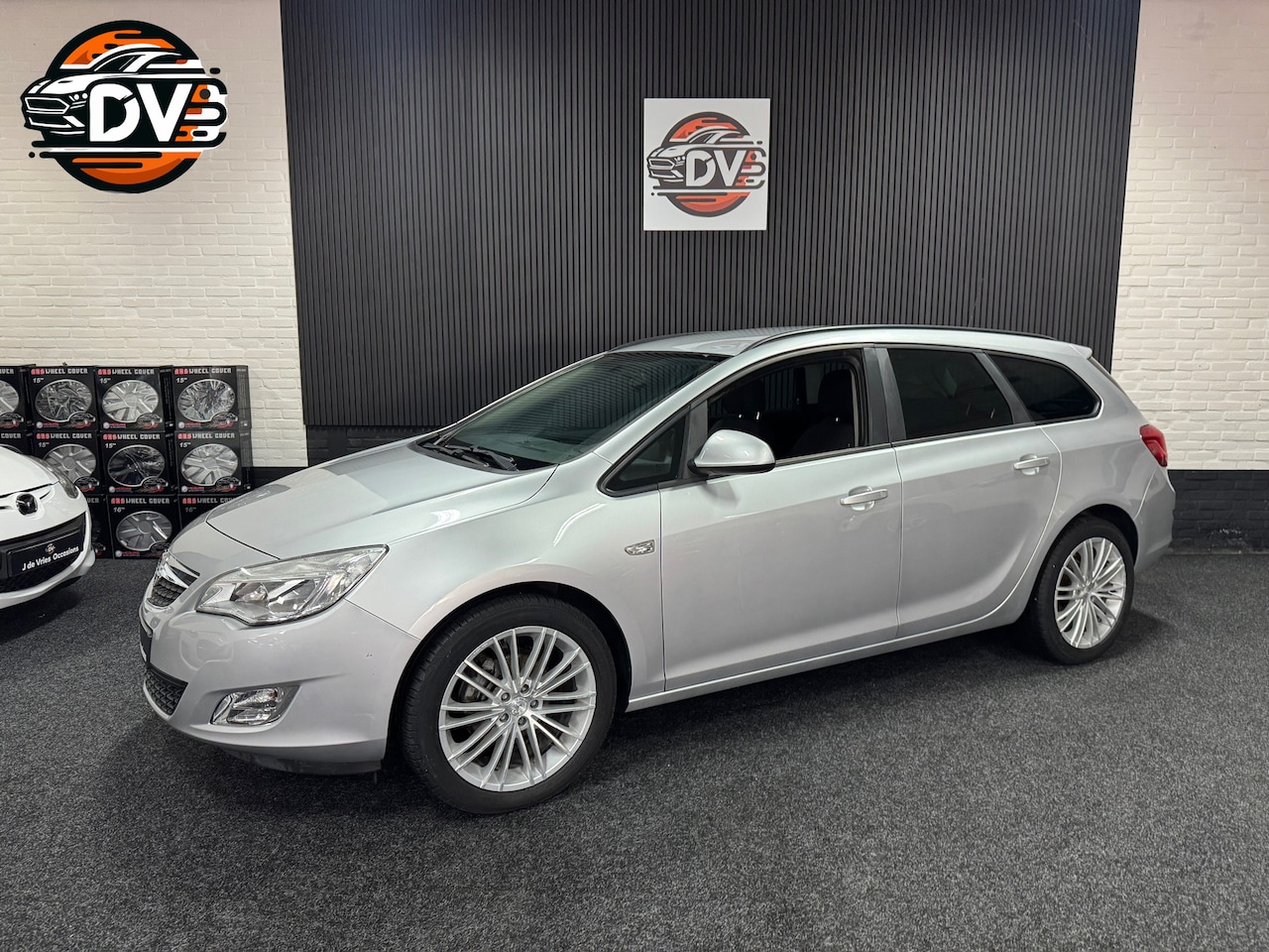 Opel Astra Sports Tourer - 1.4 Edition LMV AIRCO TREKHAAK ELEK PAKKET - AutoWereld.nl
