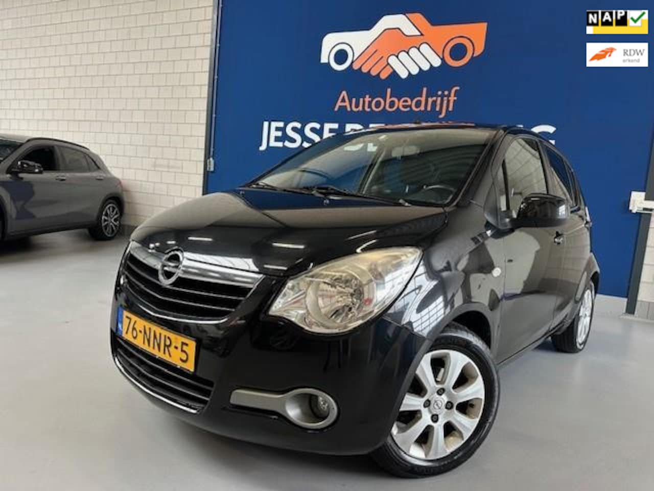 Opel Agila - 1.0 Edition / bj.2010 / kleur: zwart / 5 deurs / airco / sportvelgen / NAP met 243500 km.e - AutoWereld.nl