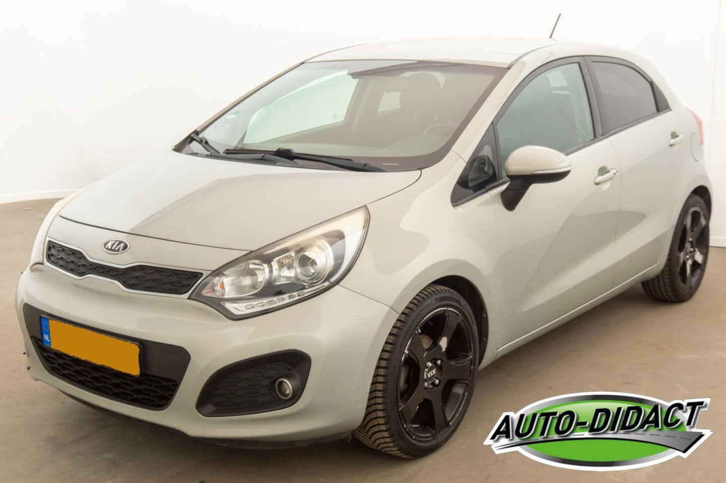 Kia Rio - 1.2 CVVT Clima Super Pack - AutoWereld.nl