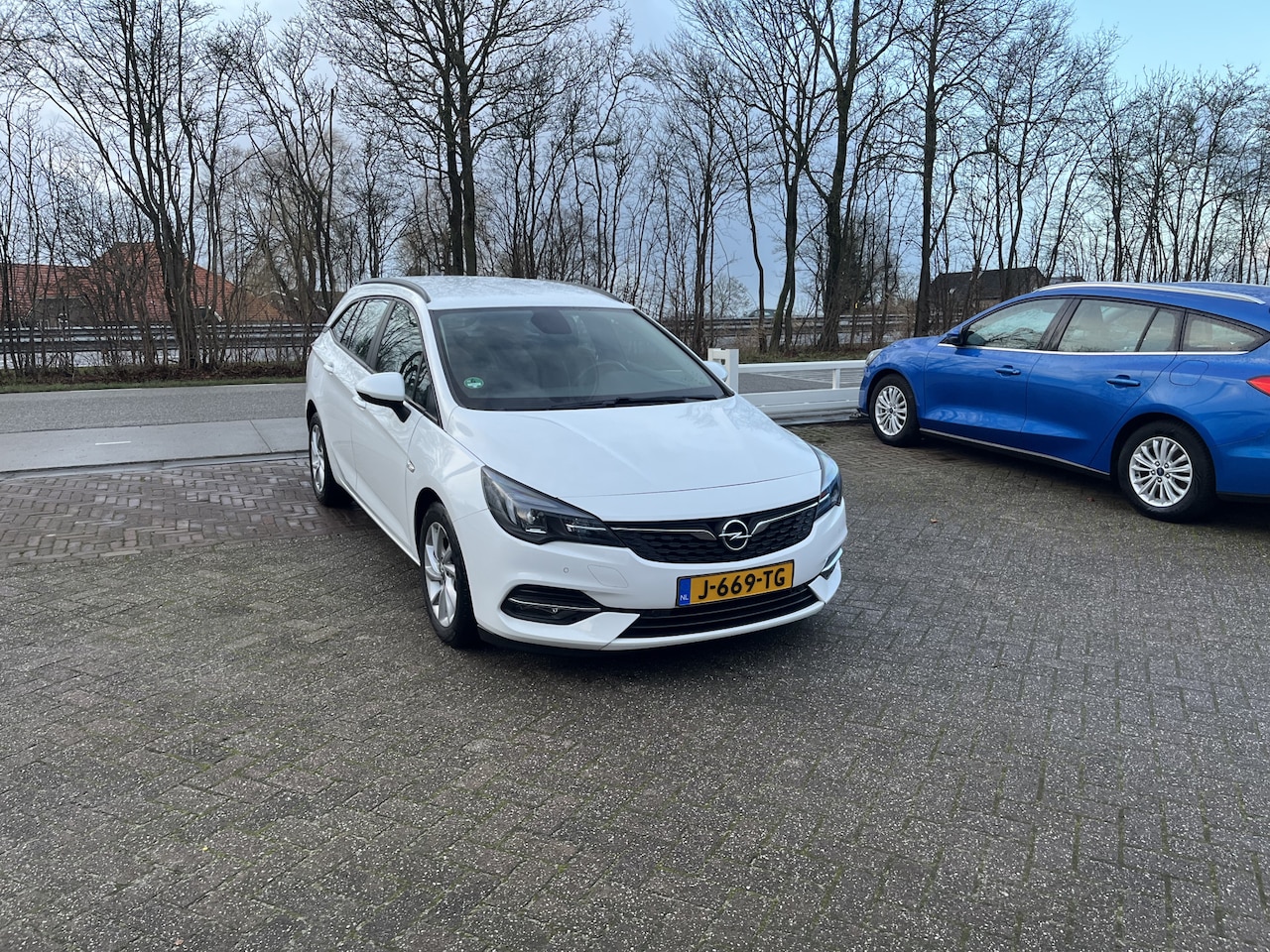Opel Astra Sports Tourer - 1.4 Edition AUTOMAAT CAMERA CLIMA NAVI - AutoWereld.nl