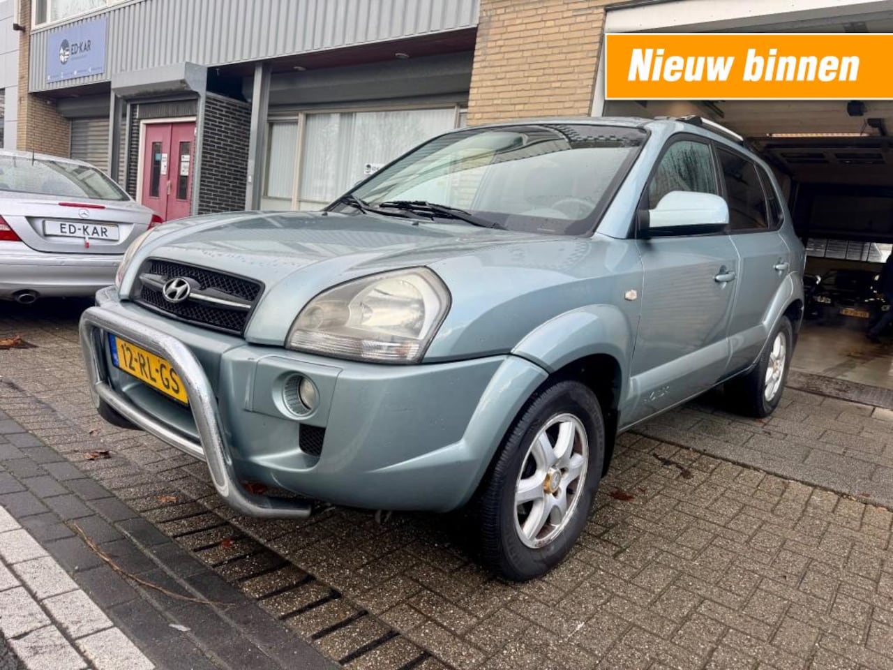 Hyundai Tucson - 2.7i V6 4WD Style AUT LEER DAK CLIMA LMV PDC NAP APK 6-2026 - AutoWereld.nl