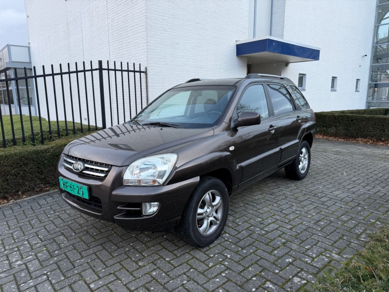 Kia Sportage - 2.0 CVVT X-ecutive 2.0 CVVT X-ECUTIVE - AutoWereld.nl