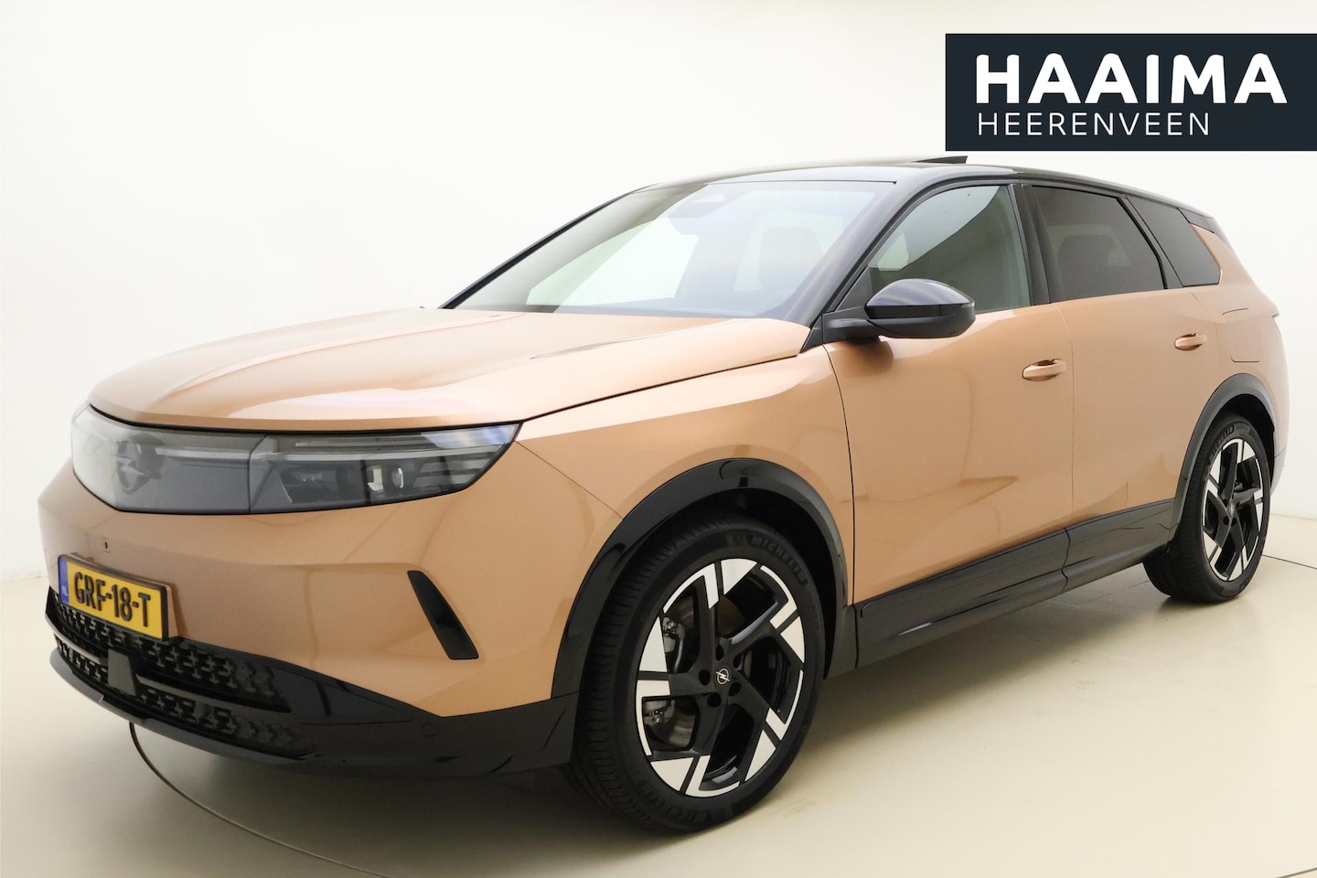 Opel Grandland Electric - GS 73 kWh | Navigatie | Glazen schuif/kanteldak | AGR stoelen | Zwart dak | Keyless | Head - AutoWereld.nl