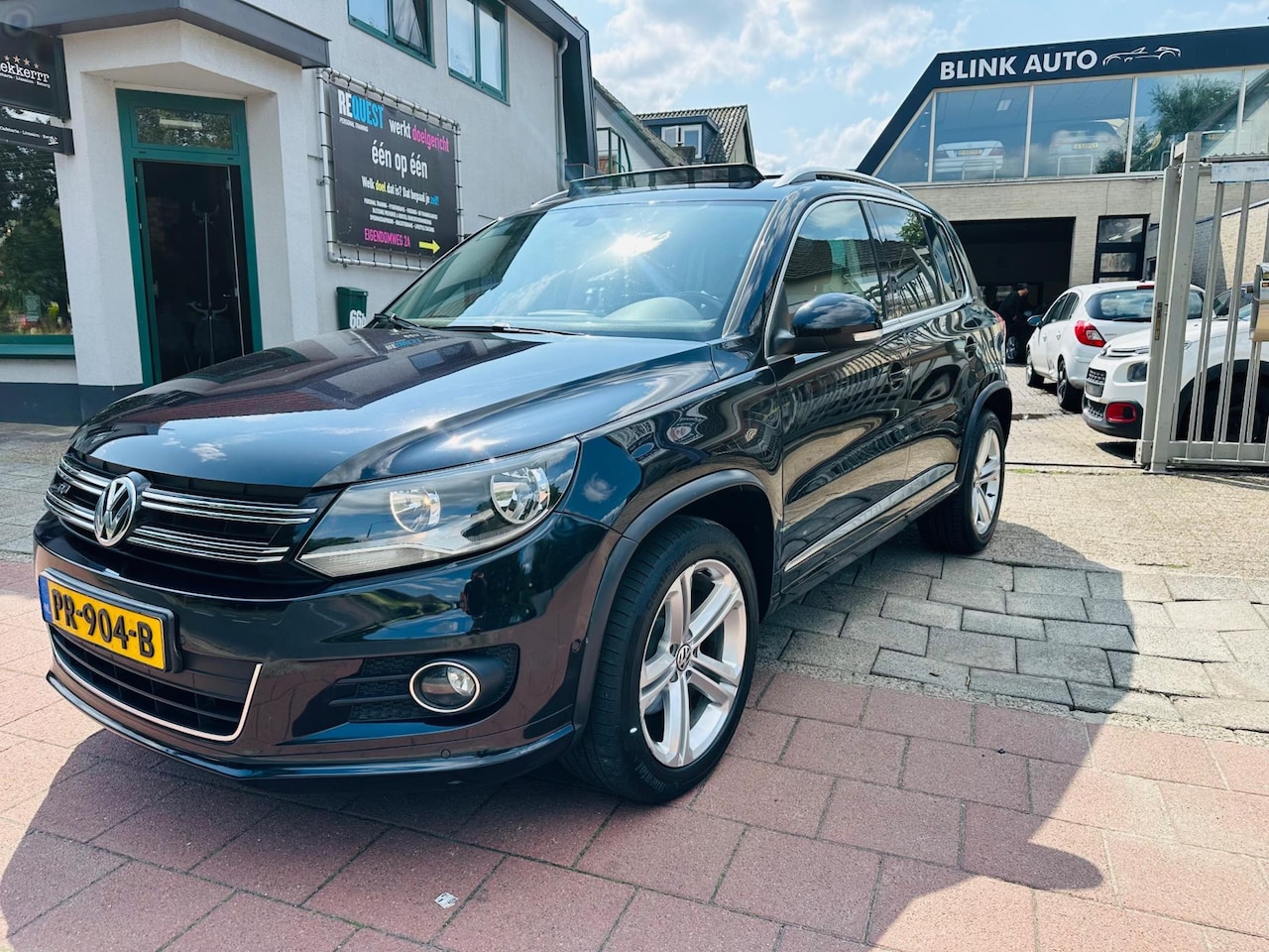 Volkswagen Tiguan - 1.4 TSI Sport&Style R-line Edition Panorama Garantie - AutoWereld.nl