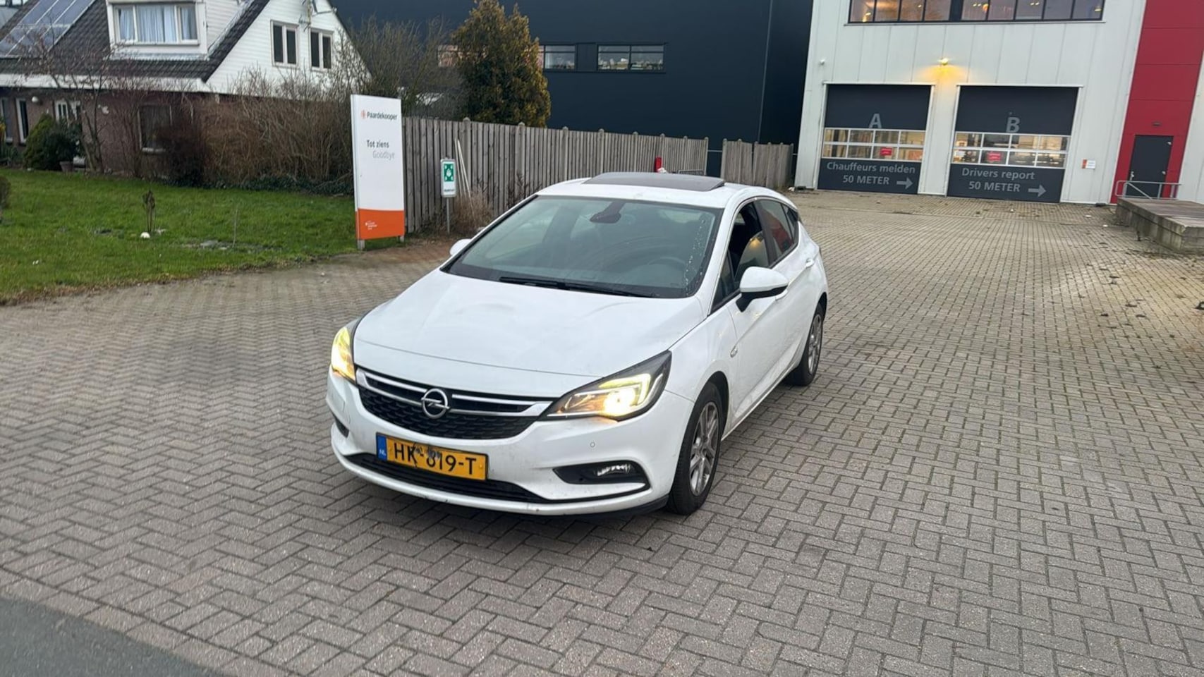 Opel Astra - 1.6 CDTI Business+ Schuifdak Wit 2015 - AutoWereld.nl