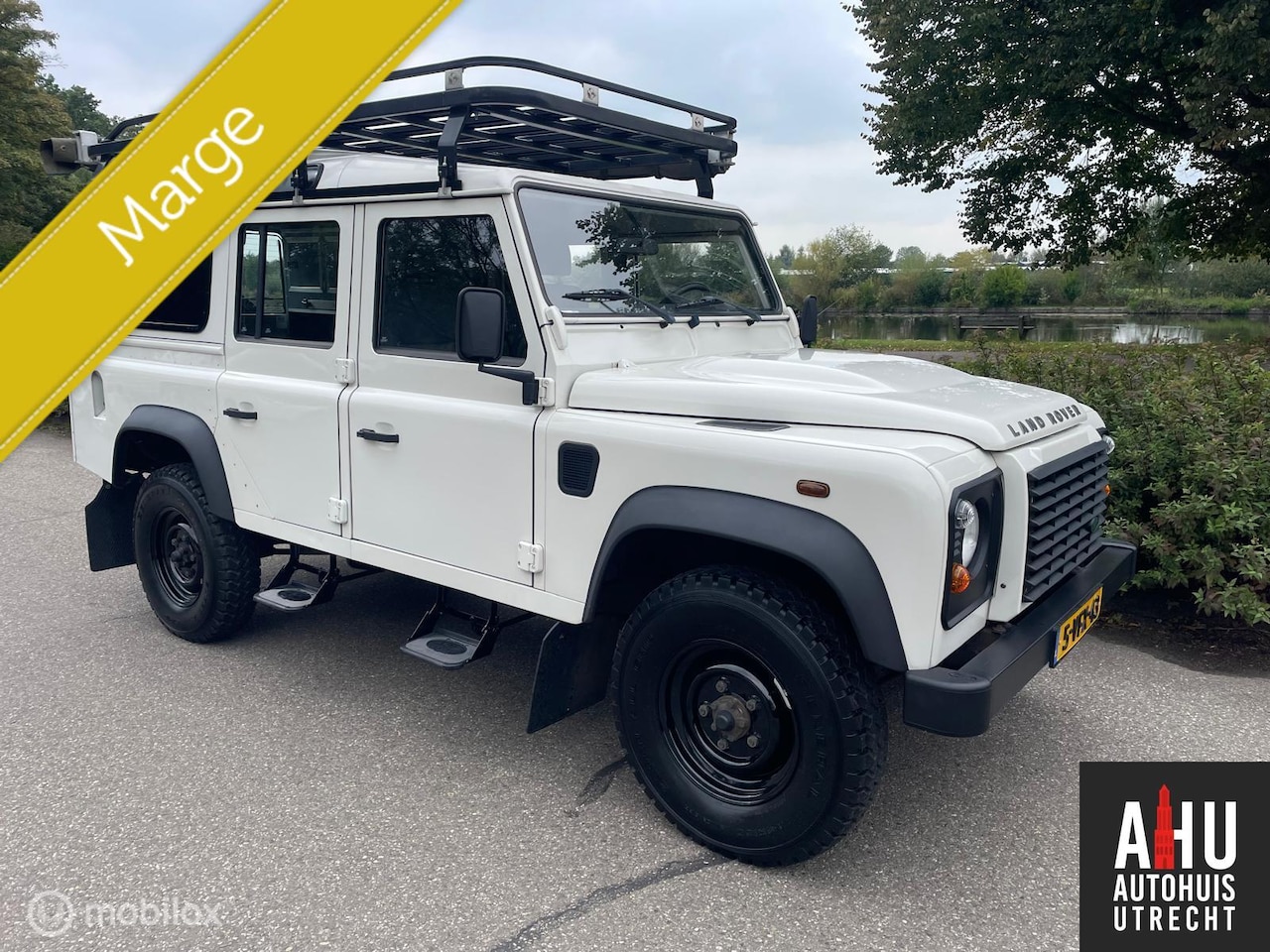 Land Rover Defender 110 - 2.4 TD SW 110/Grijs Kenteken/Camper - AutoWereld.nl