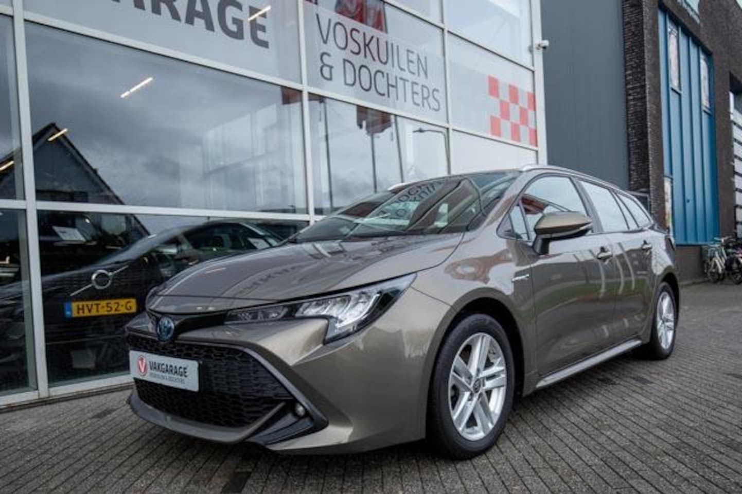Toyota Corolla Touring Sports - 1.8 Hybrid Business |Apple Carplay| Navi | Stoelverw - AutoWereld.nl