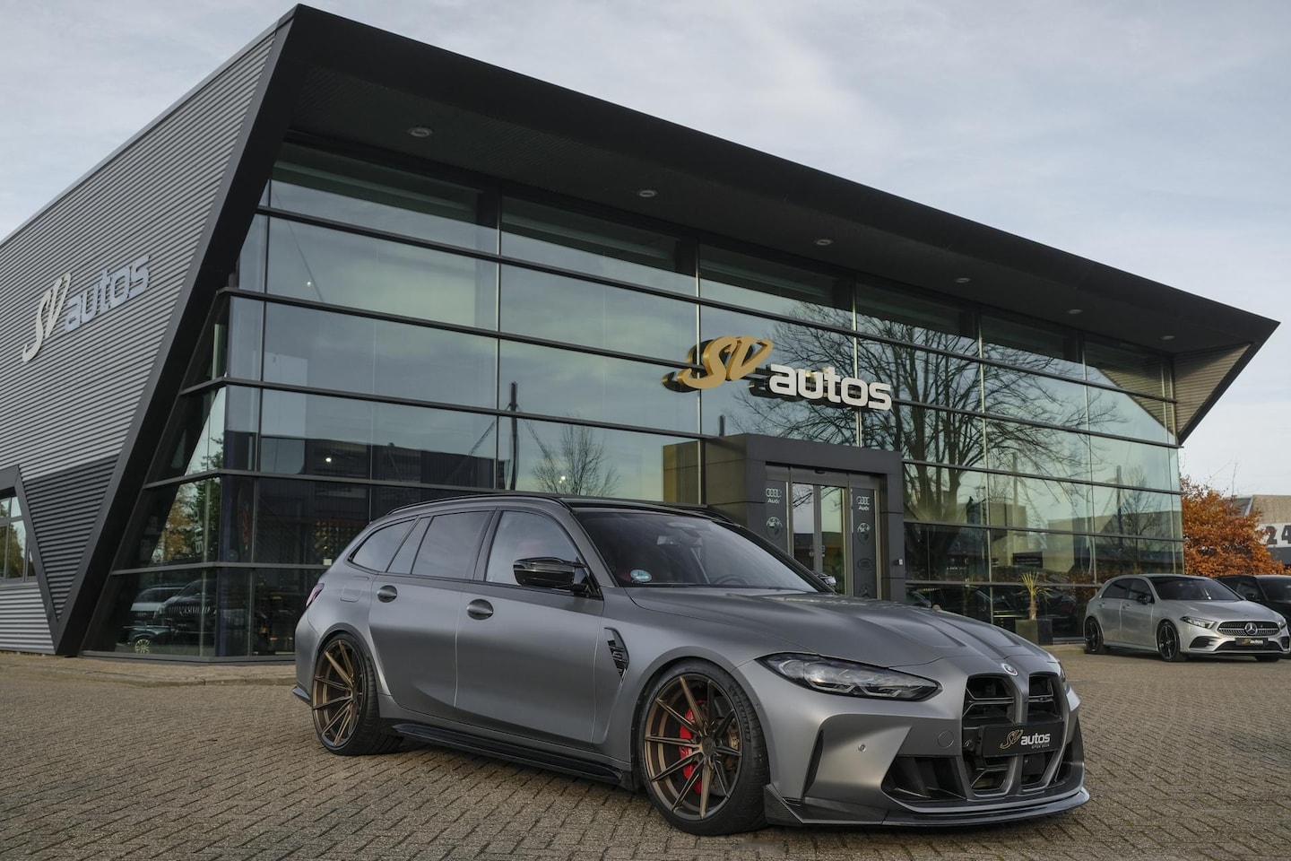 BMW 3-serie Touring - M3 Competition 510pk xDrive Widescreen Frozen grey *BTW* Head-up Adaptive cruise CSL grill - AutoWereld.nl