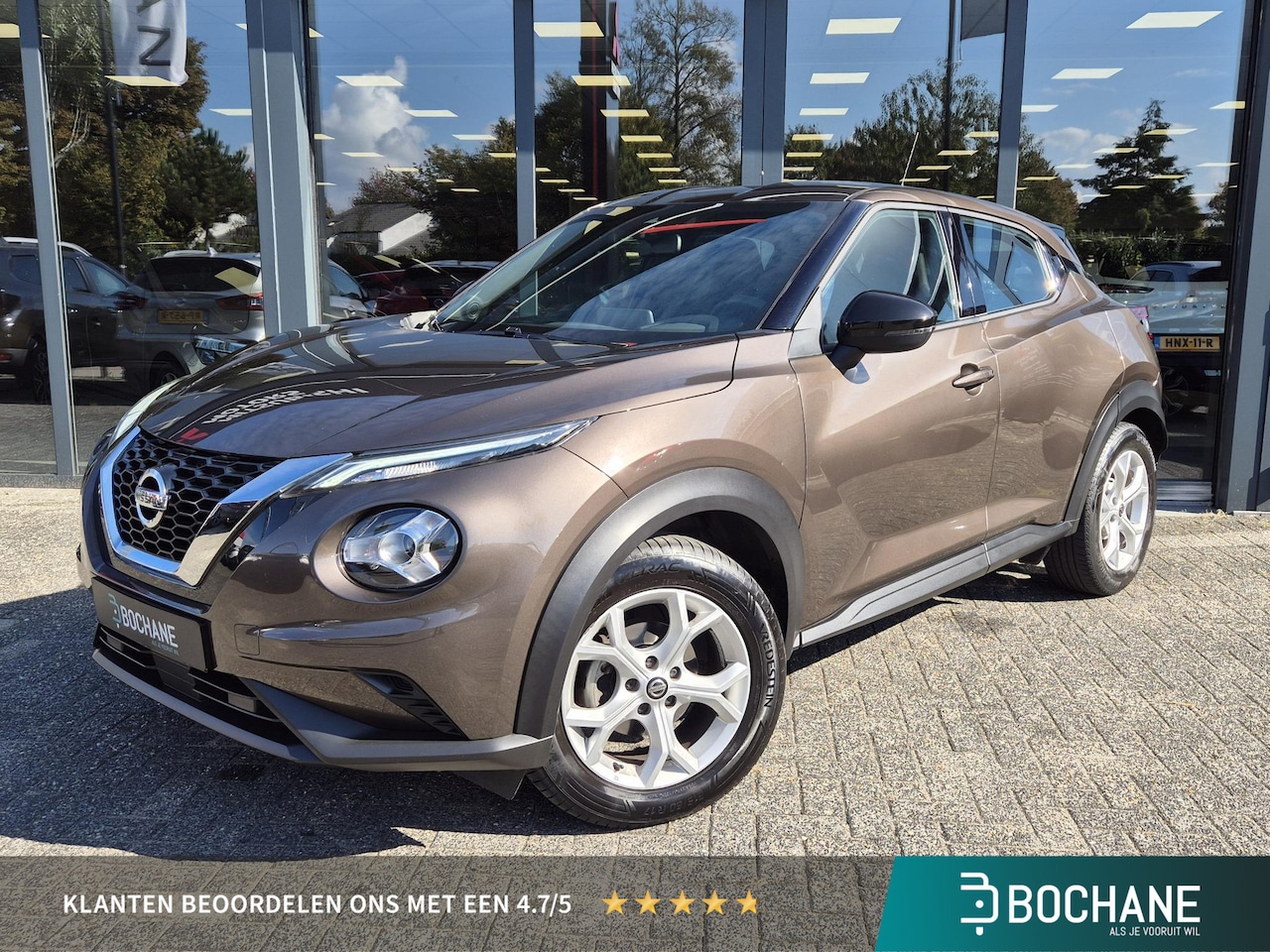 Nissan Juke - 1.0 DIG-T Acenta | Winterpakket | Speciale kleur | Climatronic - AutoWereld.nl