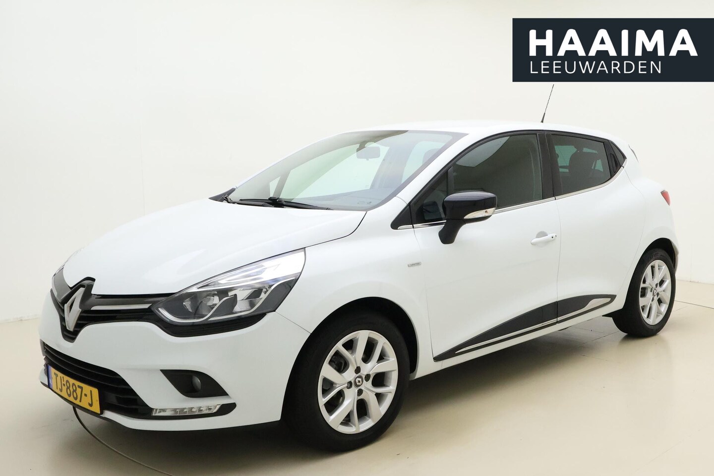 Renault Clio - 1.2 TCe Limited 120 PK | Handgeschakeld | Airco | Parkeersensor | Cruise Control | Licht M - AutoWereld.nl