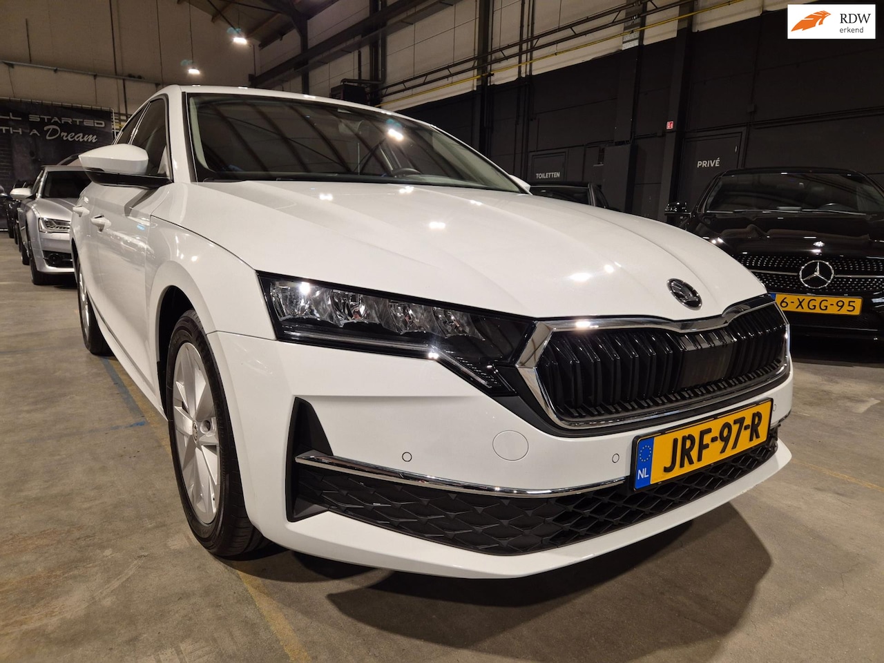 Skoda Octavia - 1.5 TSI MHEV Business - Navi - CarPlay - Camera - Adapt Cr - Climate - Stoelverw - Keyless - AutoWereld.nl