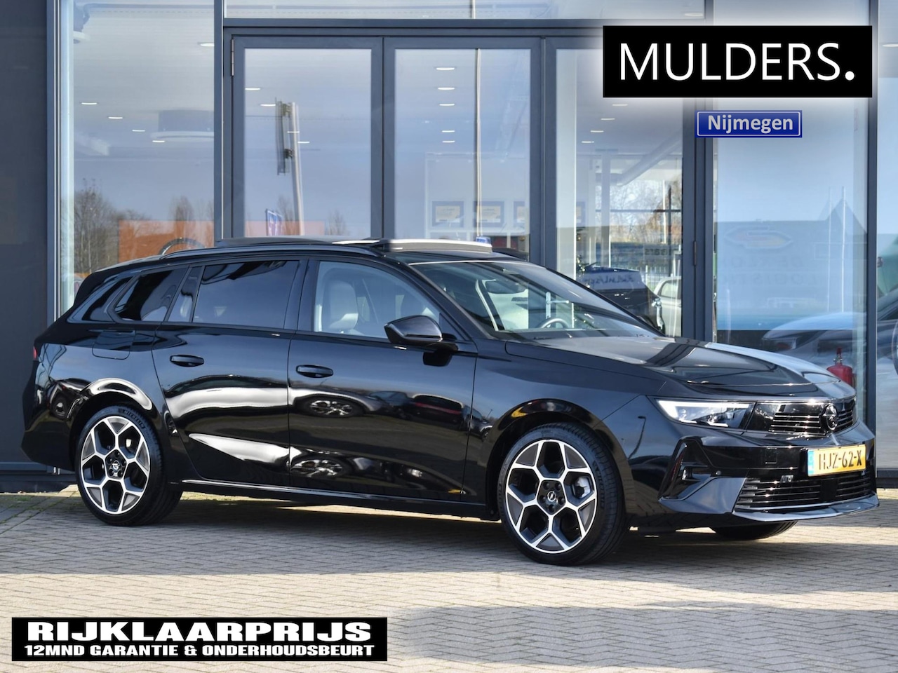 Opel Astra Sports Tourer - 1.2 Turbo Hybrid Ultimate | Schuif-kantel dak / Stoel-stuur verw. / Head up Display - AutoWereld.nl