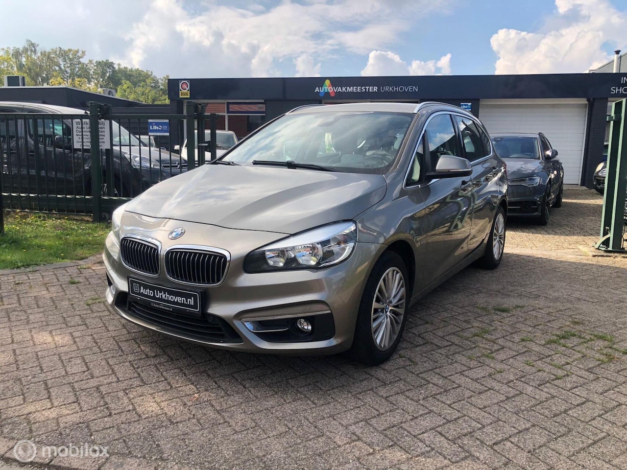 BMW 2-serie Active Tourer - 117.DKM ECC LEDER NAVI PDC 220i - AutoWereld.nl