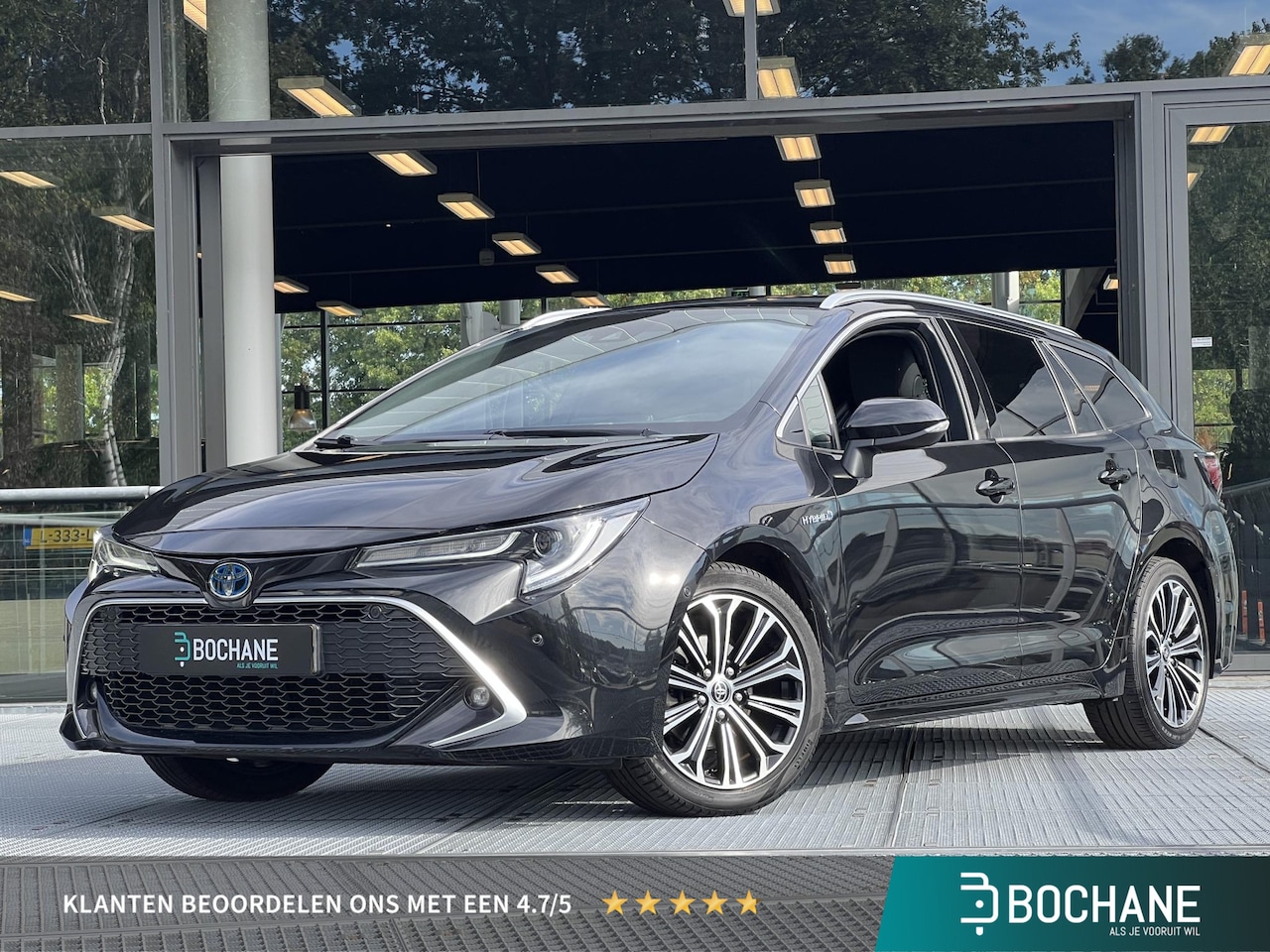 Toyota Corolla Touring Sports - 1.8 Hybrid Executive 122PK | Navigatie | Half-leder | Carplay | HUD - AutoWereld.nl