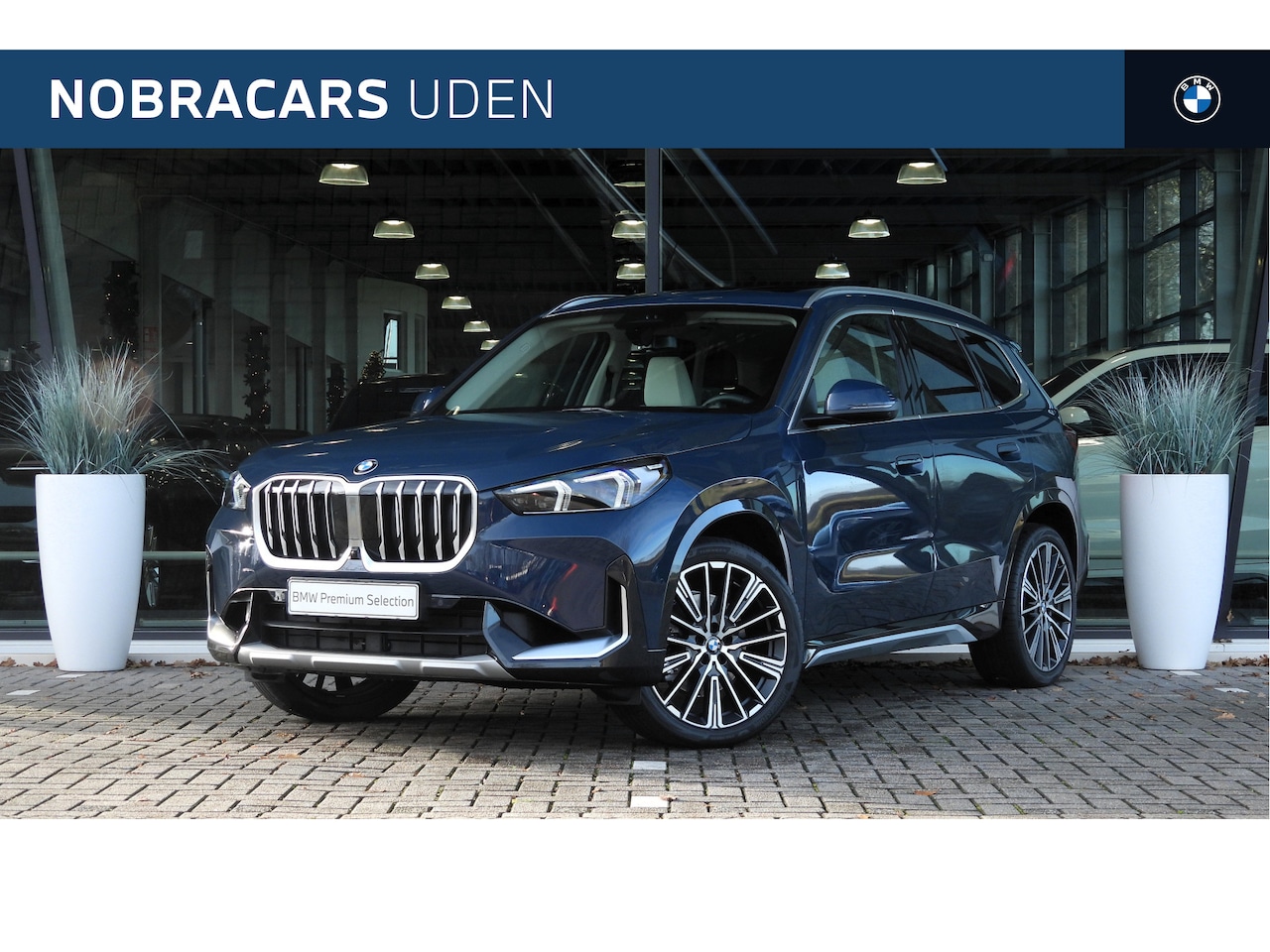 BMW X1 - xDrive23i High Executive xLine Automaat / Panoramadak / Trekhaak / Sportstoelen / Parking - AutoWereld.nl