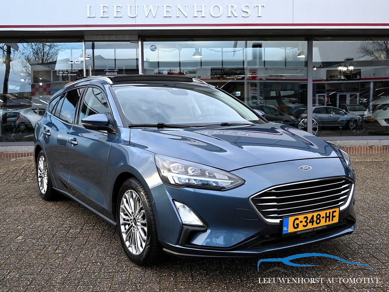 Ford Focus Wagon - 1.0 EcoBoost Titanium Business 1.0 EcoBoost Titanium Business, automaat, panoramadak, camera, LED, navi, adapt. cruise, N - AutoWereld.nl