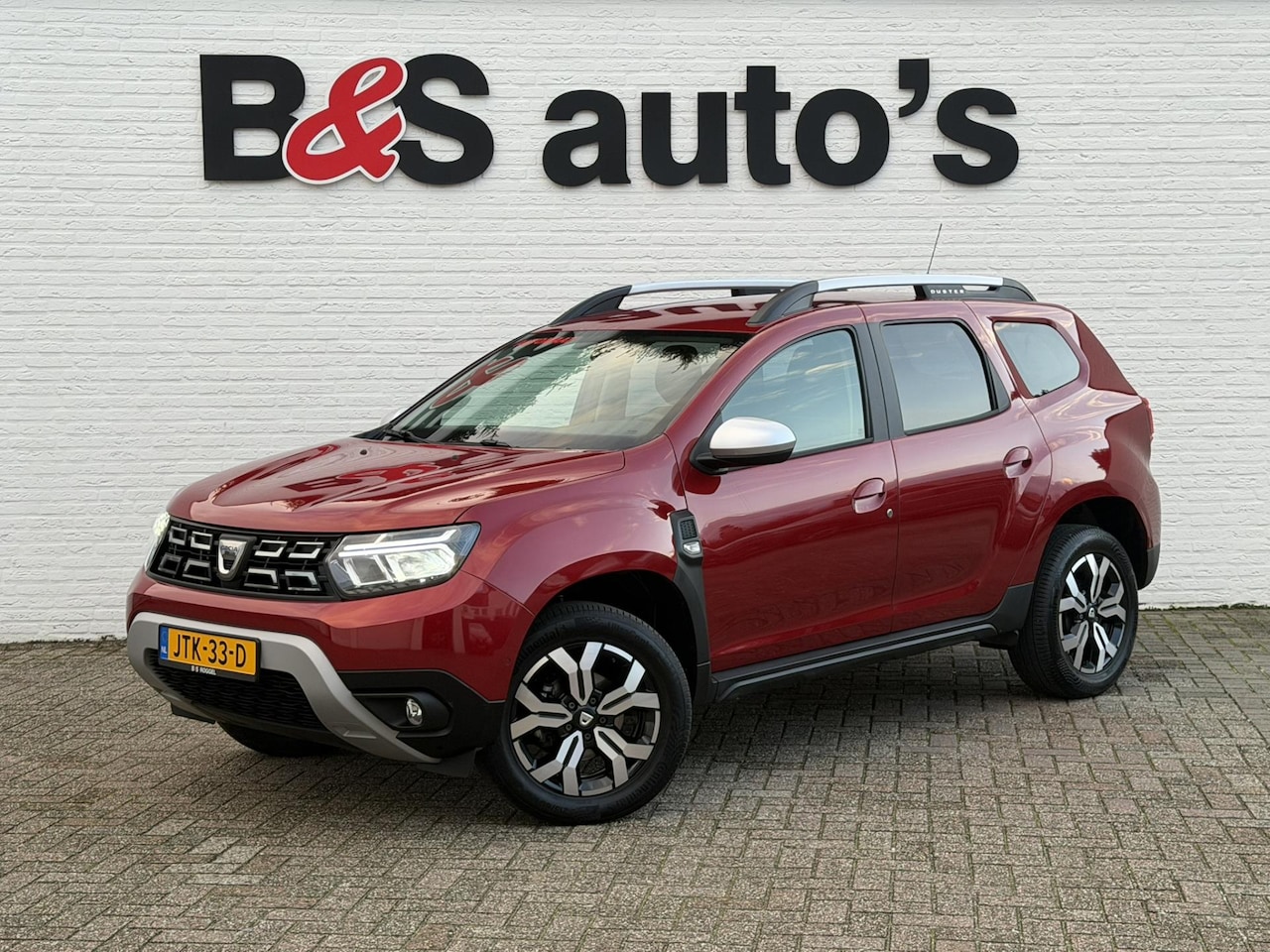 Dacia Duster - 1.3 TCe Automaat Navi Camera Pdc Clima Trekhaak Cruise - AutoWereld.nl