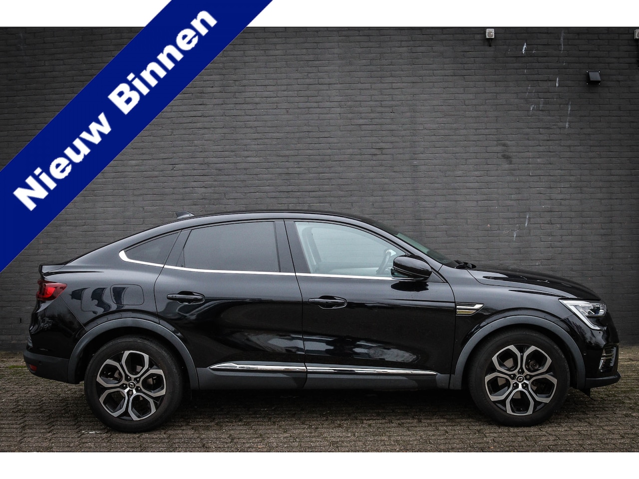 Renault Arkana - 1.6 E-Tech Hybrid 145 Intens Net binnen - Nu al te bezichtigen - AutoWereld.nl