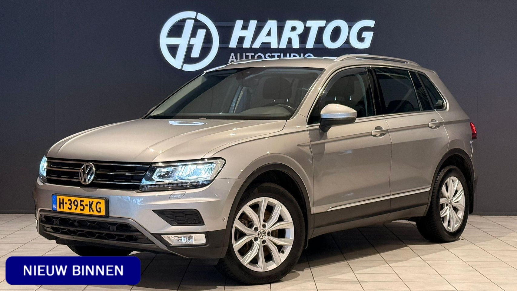 Volkswagen Tiguan - 2.0 TSI 4Motion Highline + TREKHAAK / CAMERA / STOELVERWARMING - AutoWereld.nl