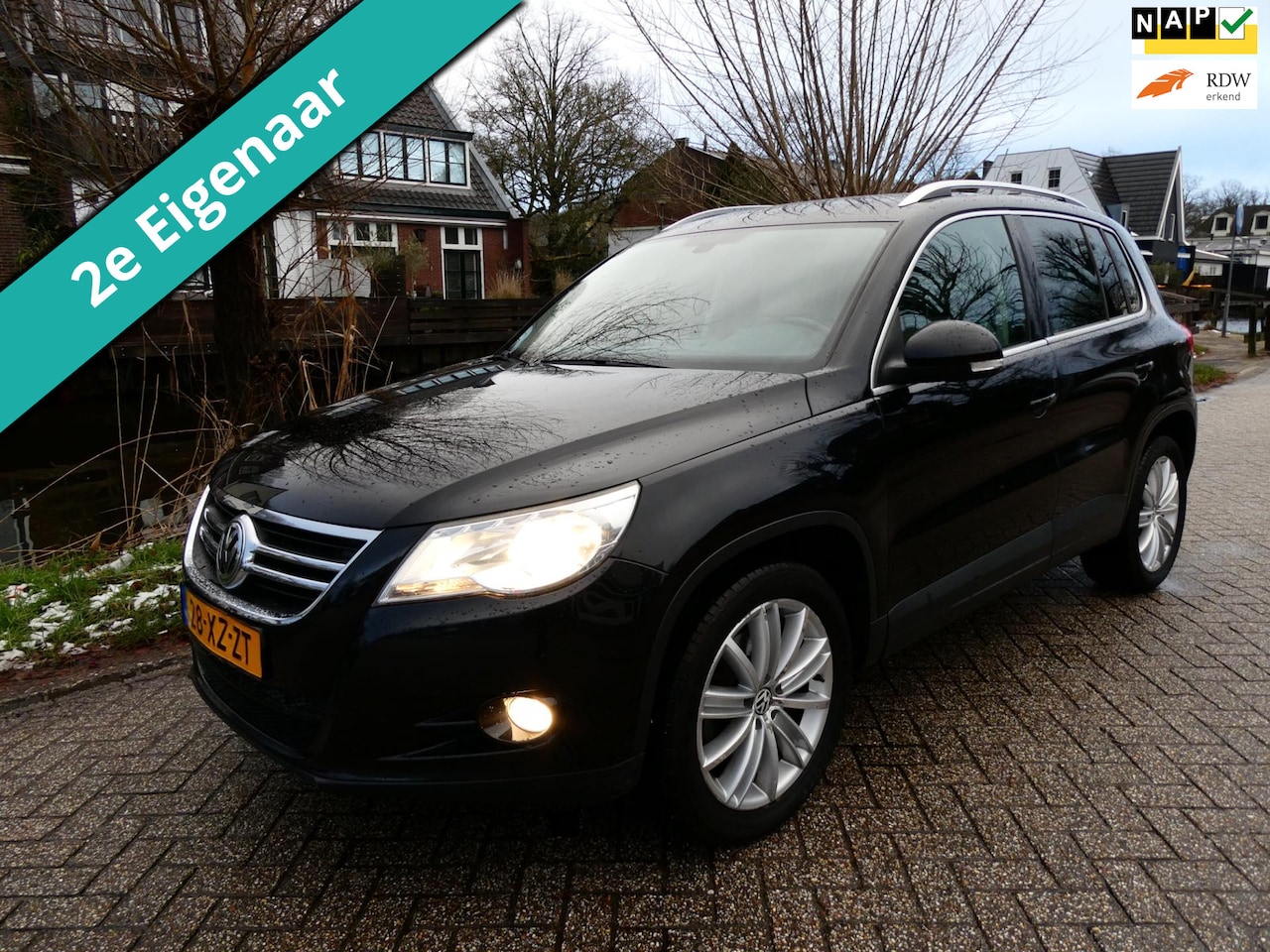 Volkswagen Tiguan - 1.4 TSI Sport&Style 4Motion 150pk 2e eig. Clima Leder - AutoWereld.nl