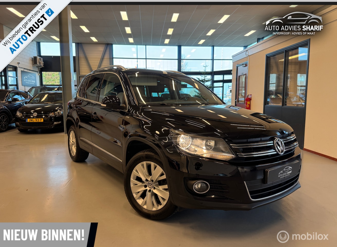 Volkswagen Tiguan - 1.4 TSI Life Edition|PDC|Automaat|Climate! - AutoWereld.nl