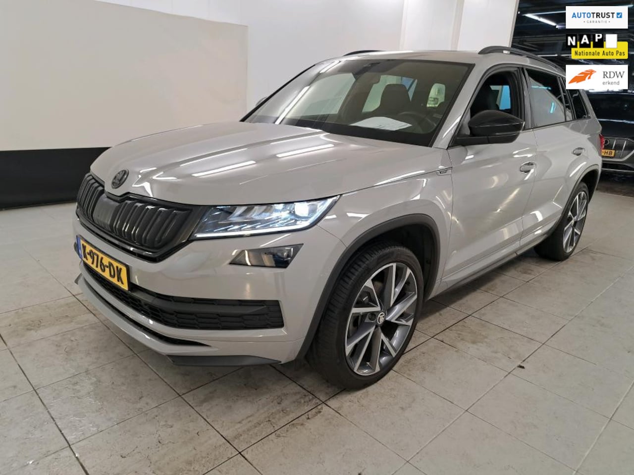 Skoda Kodiaq - 1.5 TSI Sportline DSG 7-pers PANO l CANTON l TREKHAAK l 20INCH l CAMERA l ADAPT.CRUISE l K - AutoWereld.nl