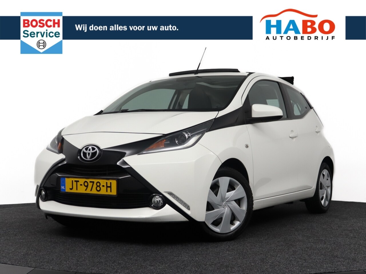 Toyota Aygo - 1.0 VVT-I X-WAVE 5DRS AC/SPEED.LIMIT/CAMERA/SCHUIF.DAK - AutoWereld.nl