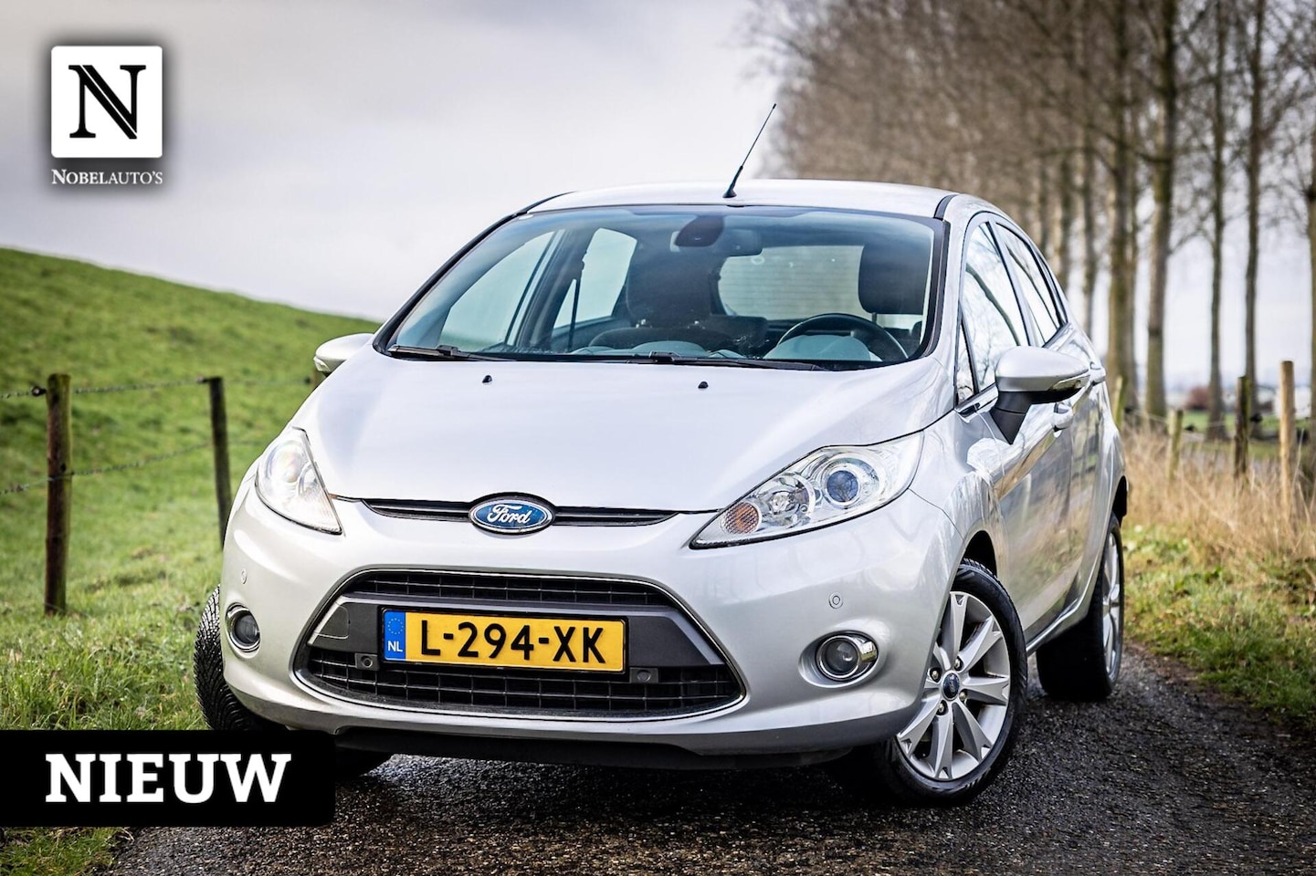 Ford Fiesta - 1.25 Ghia | LM Velgen | 5 Deurs | Parkeersensor - AutoWereld.nl