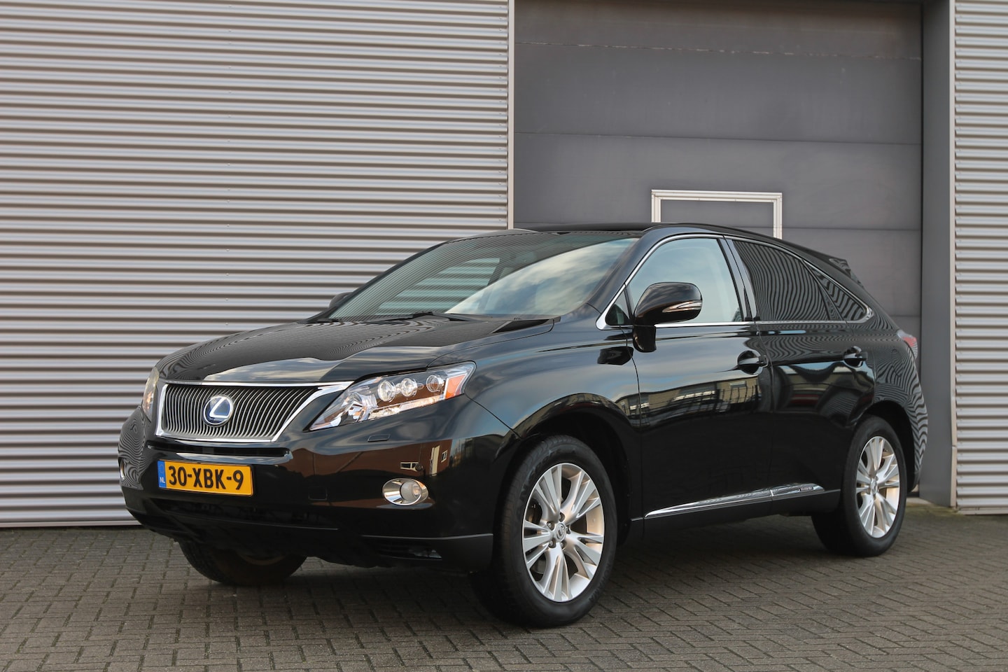Lexus RX 450h - 4WD Luxury I Aut. I Navi I Leder I Camera - AutoWereld.nl