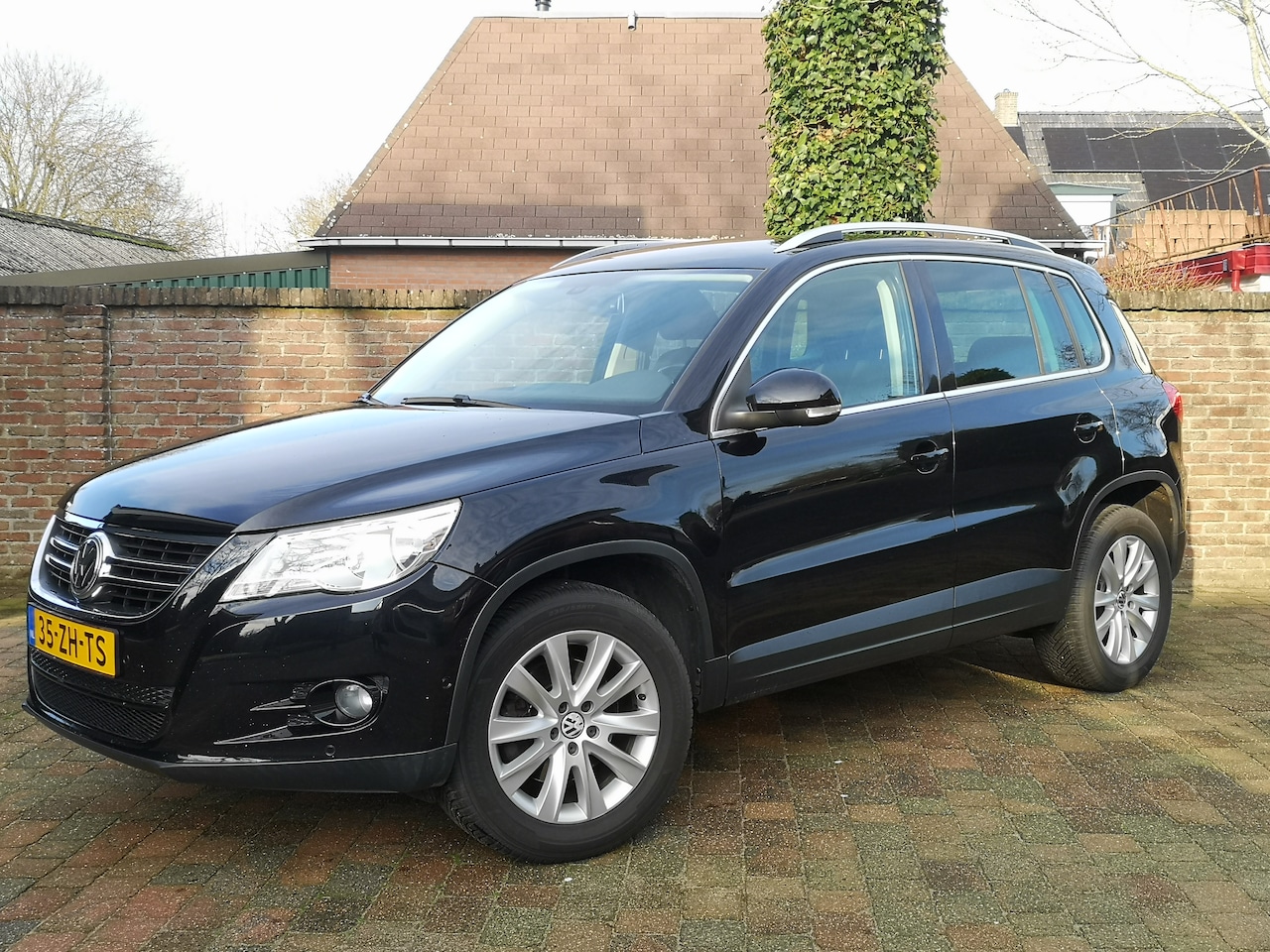 Volkswagen Tiguan - 2.0 TDI Sport&Style 4Motion Trekhaak - AutoWereld.nl