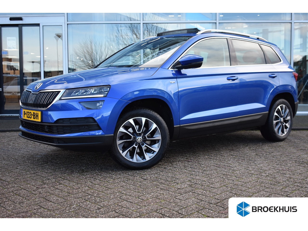 Skoda Karoq - 1.5 TSI 150PK DSG-7 Business Edition | PANORAMADAK | TREKHAAK | ELEKTR. A. KLEP | NAVIGATI - AutoWereld.nl