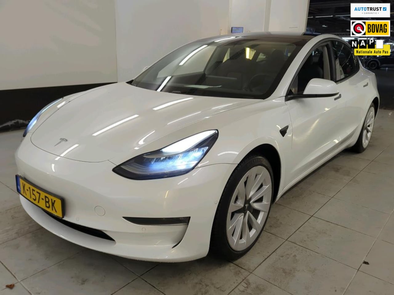 Tesla Model 3 - FACELIFT* Long Range AWD 75 kWh SOH92% 1E EIG ORG NL|TREKHAAK|CAMERA|AUTOPILOT|PANO|STOELV - AutoWereld.nl