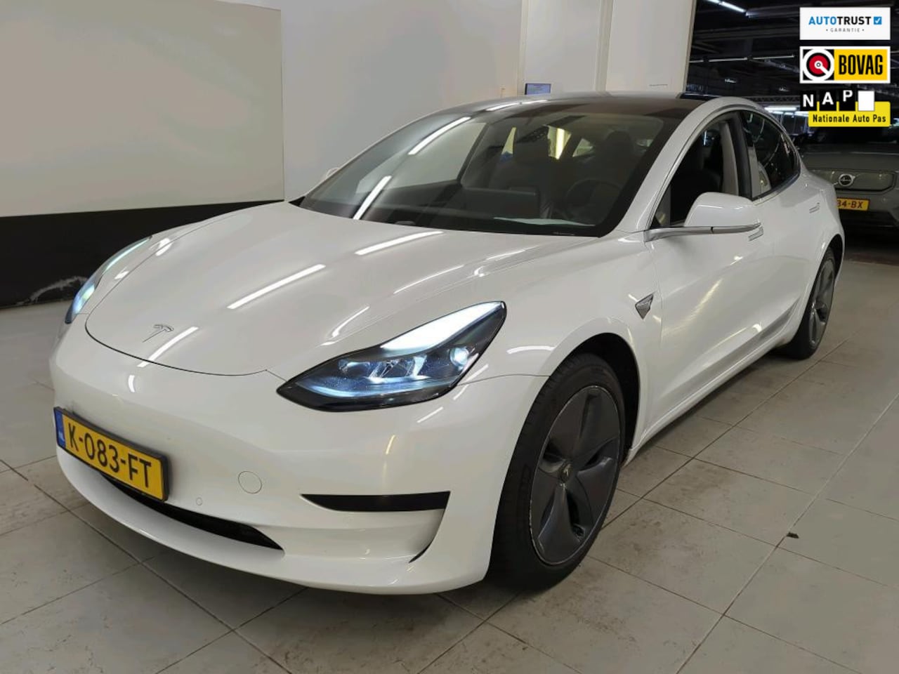 Tesla Model 3 - Standard RWD Plus 60 kWh SOH90% 1E EIG DEALEROND|AUTOPILOT|CAMERA|LEER|STOELVRM|PANO|NAVI| - AutoWereld.nl