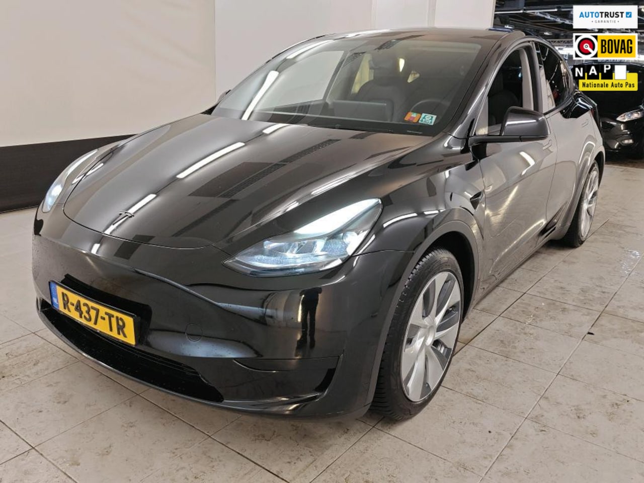 Tesla Model Y - RWD 58 kWh SOH 90% EERSTE EIG DEALER OND TREKHAAK - AutoWereld.nl