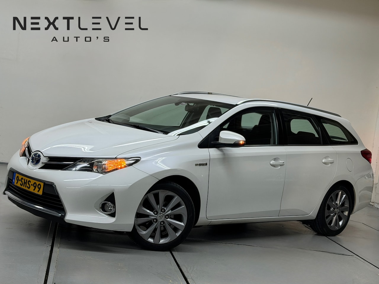 Toyota Auris Touring Sports - 1.8 Hybrid Lease Pro Camera Cruise DealerOnderhouden - AutoWereld.nl