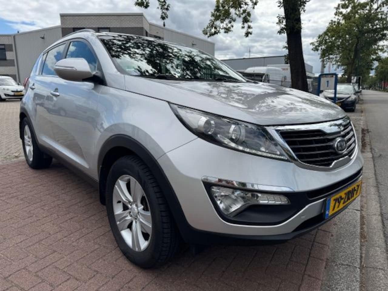 Kia Sportage - 2.0 Plus Pack Automaat 131.000km Airco/ECC,Navigatie,Panoramadak - AutoWereld.nl