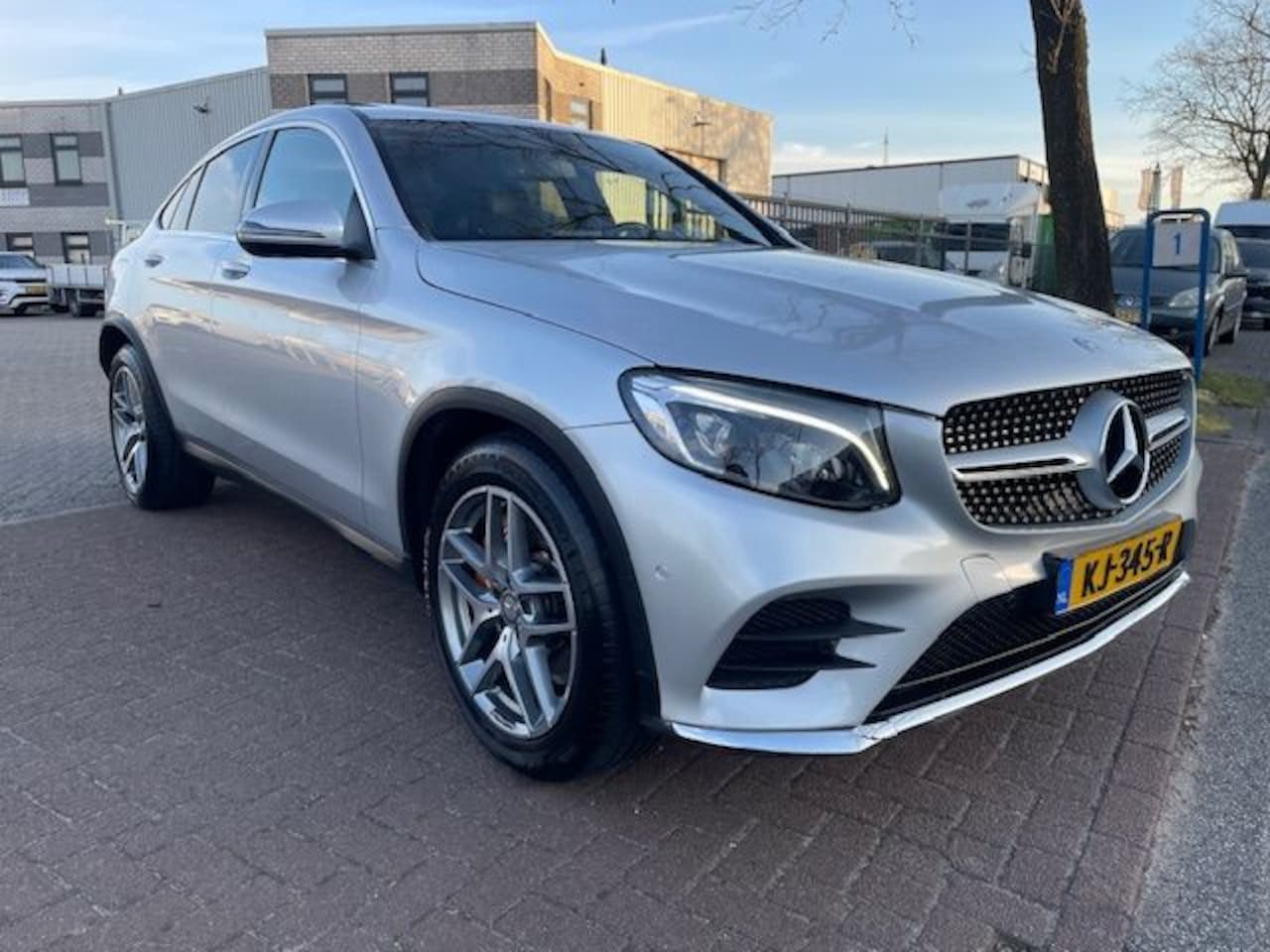 Mercedes-Benz GLC-klasse Coupé - 220 d 4MATIC Ambition Airco/ECC,Navigatie,Camera,Open dak - AutoWereld.nl